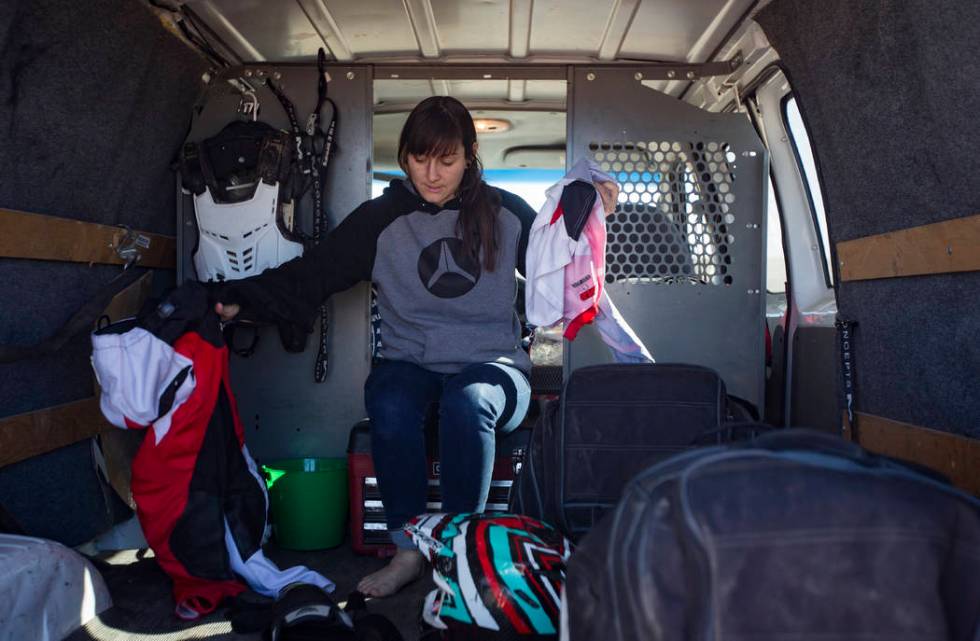 Angie Wright gets her riding clothes on at Western Raceway track outside White Hills, Arizona, Sunday, Feb. 24, 2019. Wright will be racing in the Mint 400's motorcycle race, the first dirt bike r ...