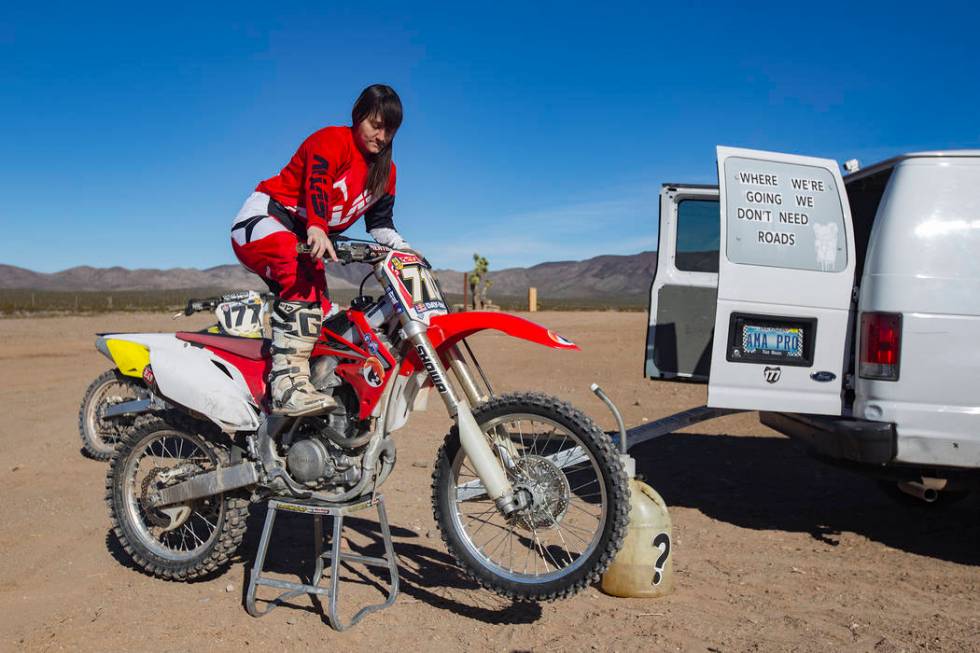 Angie Wright starts her bike at Western Raceway track outside White Hills, Arizona, Sunday, Feb. 24, 2019. Wright will be racing in the Mint 400's motorcycle race, the first dirt bike race for the ...