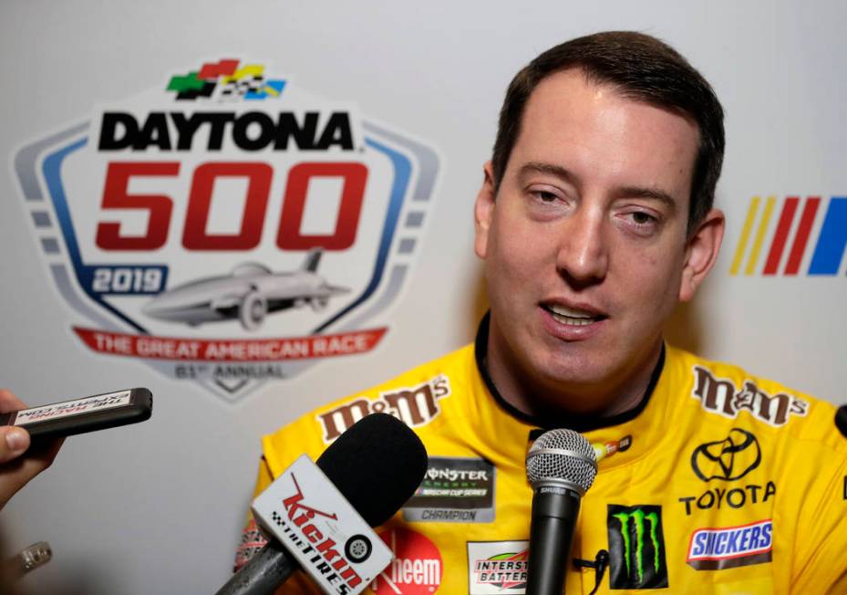 Kyle Busch talks during NASCAR Daytona 500 auto racing media day at Daytona International Speedway, Wednesday, Feb. 13, 2019, in Daytona Beach, Fla. (AP Photo/John Raoux)