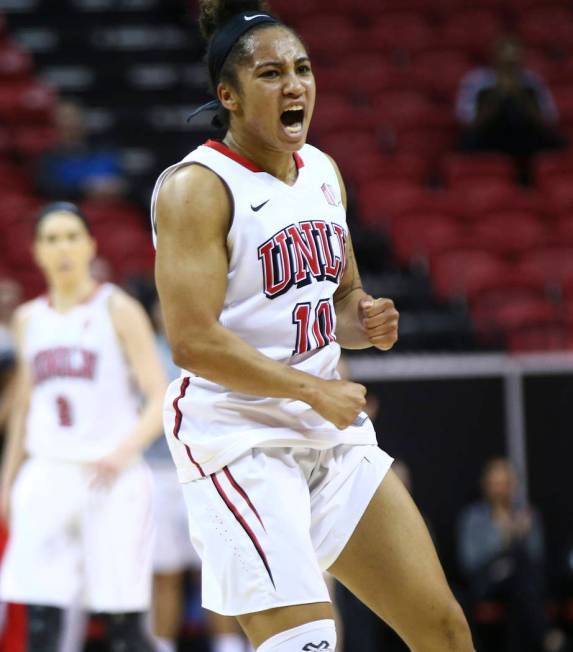 UNLV Lady Rebels guard Nikki Wheatley (10) celebrates after scoring against the UNR Wolf Pack during the first half of a basketball game in the Mountain West tournament quarterfinals at the Thomas ...