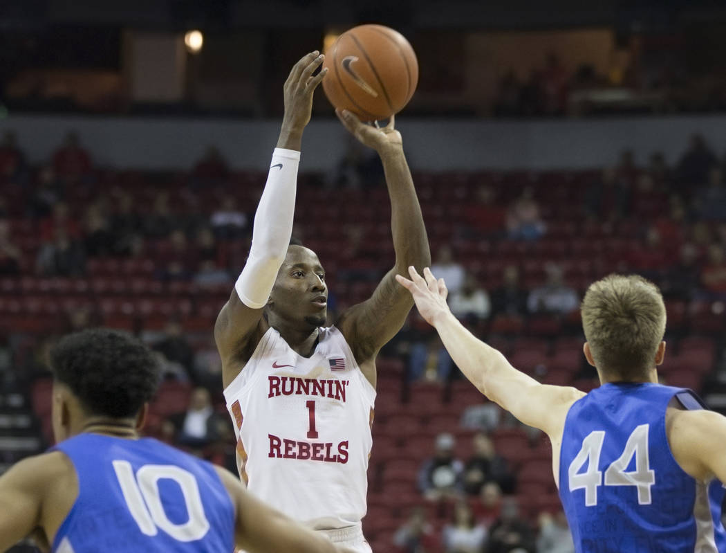 UNLV senior guard Kris Clyburn (1) shoots a three point shot over Air Force sophomore guard Keaton Van Soelen (44) in the second half on Tuesday, Feb. 12, 2019, at the Thomas & Mack Center, in ...
