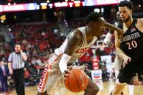 UNLV Rebels guard Kris Clyburn (1) moves the ball around San Diego State Aztecs guard Jordan Schakel (20) during the second half of a basketball game at the Thomas & Mack Center in Las Vegas o ...