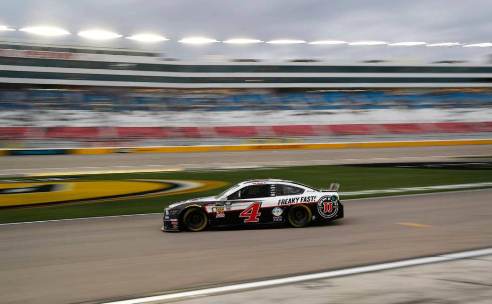 Kevin Harvick (4) drives down pit lane during qualifying for a NASCAR Cup Series auto race at the Las Vegas Motor Speedway, Friday, March 1, 2019, in Las Vegas. (AP Photo/John Locher)