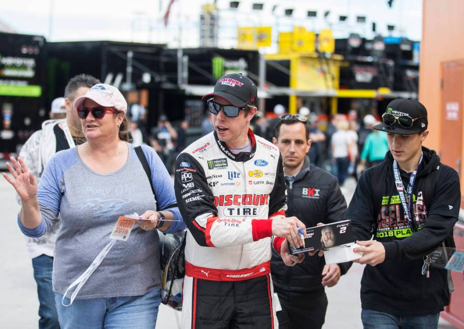 Brad Keselowski, middle, walks in pit row after completing his practice run on Saturday, March 2, 2019, at Las Vegas Motor Speedway, in Las Vegas. (Benjamin Hager Review-Journal) @BenjaminHphoto