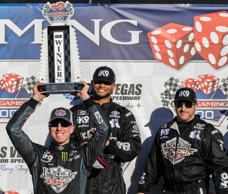 Kyle Busch, left, hoists the trophy for winning the NASCAR Xfinity Series Boyd Gaming 300 on Saturday, March 2, 2019, at Las Vegas Motor Speedway, in Las Vegas. (Benjamin Hager Review-Journal) @Be ...