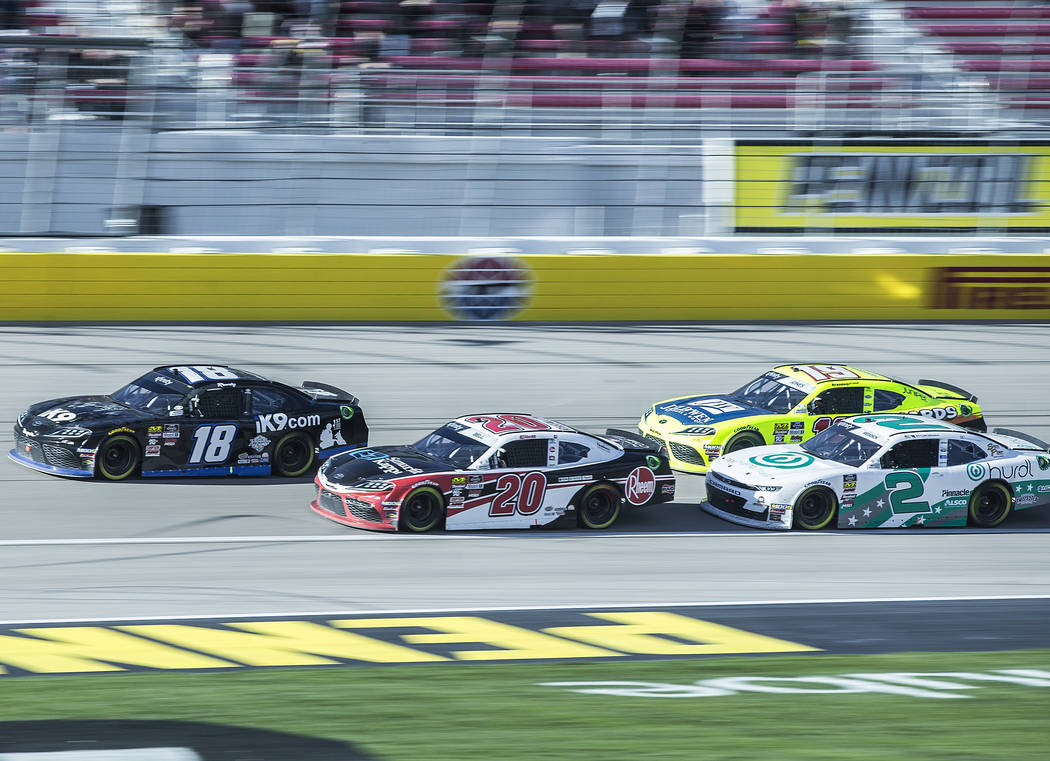 Kyle Busch (18) leads Christoper Bell (20), Tyler Reddick (2) and Brandon Jones (19) during the Boyd Gaming 300 on Saturday, March 2, 2019, at Las Vegas Motor Speedway, in Las Vegas. Busch won the ...