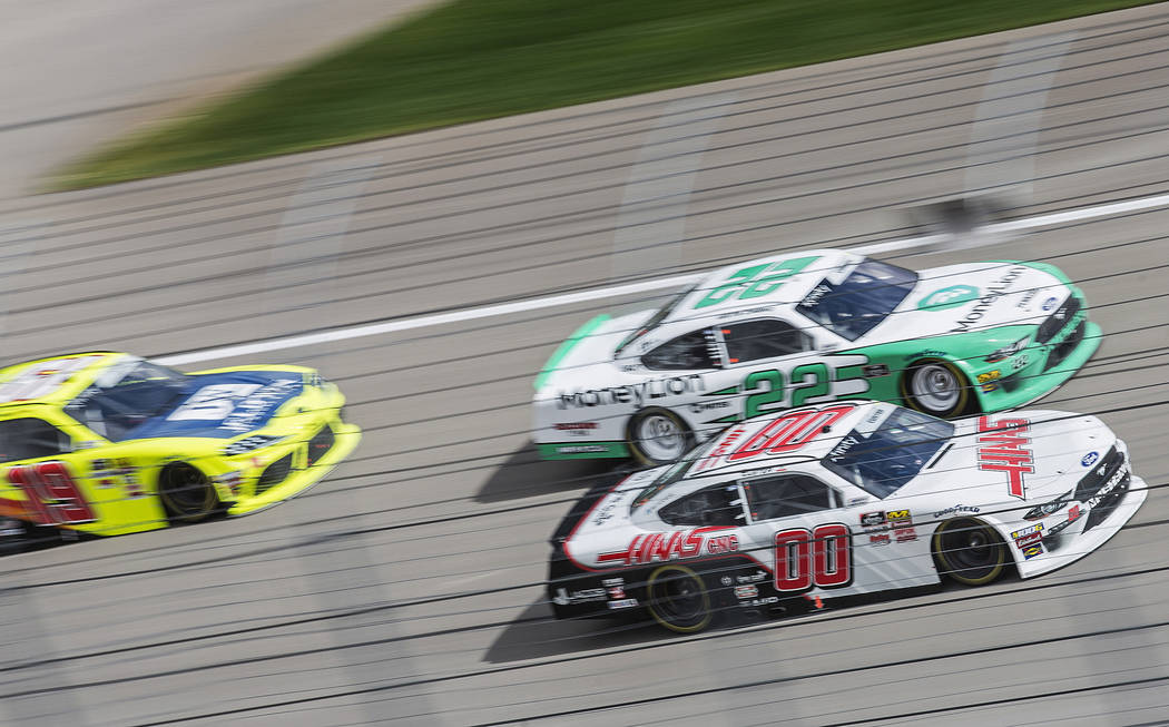 Brandon Jones (19), Austin Cindric (22) and Cole Custer (00) race around turn one during the NASCAR Xfinity Series Boyd Gaming 300 on Saturday, March 2, 2019, at Las Vegas Motor Speedway, in Las V ...