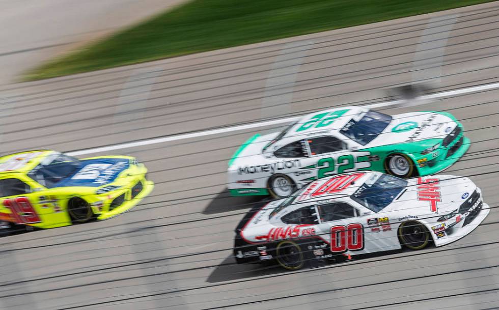 Brandon Jones (19), Austin Cindric (22) and Cole Custer (00) race around turn one during the NASCAR Xfinity Series Boyd Gaming 300 on Saturday, March 2, 2019, at Las Vegas Motor Speedway, in Las V ...