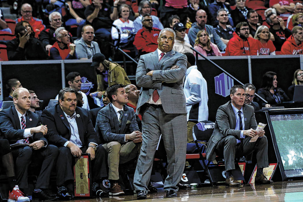 UNLV Rebels head coach Marvin Menzies reacts during the second half of a quarterfinal game against San Diego State in the Mountain West men's basketball tournament at the Thomas & Mack Center ...