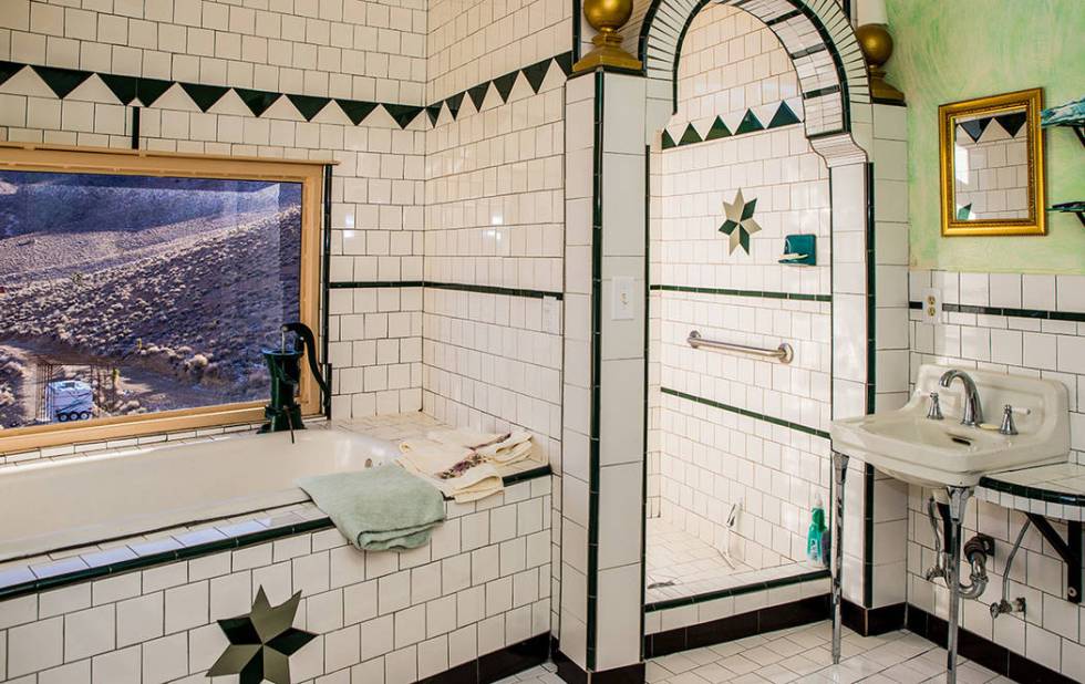 The main bath is on the third level. Owner Randy Johnston created the tile design. (Tonya Harvey Real Estate Millions)