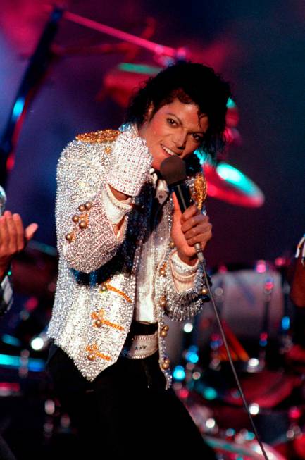 In this Dec. 3, 1984 photo, Michael Jackson performs with his brothers at Dodger Stadium in Los Angeles, as part of their Victory Tour concert. Michael Jackson accusers Wade Robson and James Safec ...