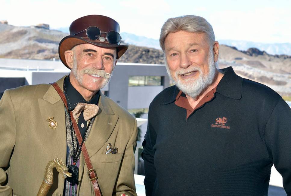 Doc Phineas, senior expert for antiquities for the History Channel and practitioner of feng shui, left, and Rich MacDonald, president and CEO of MacDonald Highlands are shown during a tour of a ho ...