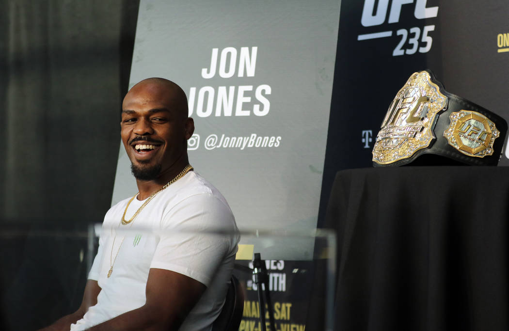 UFC light heavyweight champion Jon Jones reacts to a question asked at UFC 235 media day at the T-Mobile Arena in Las Vegas, Wednesday, Feb. 27, 2019. He will headline the fight card on March 2 ag ...