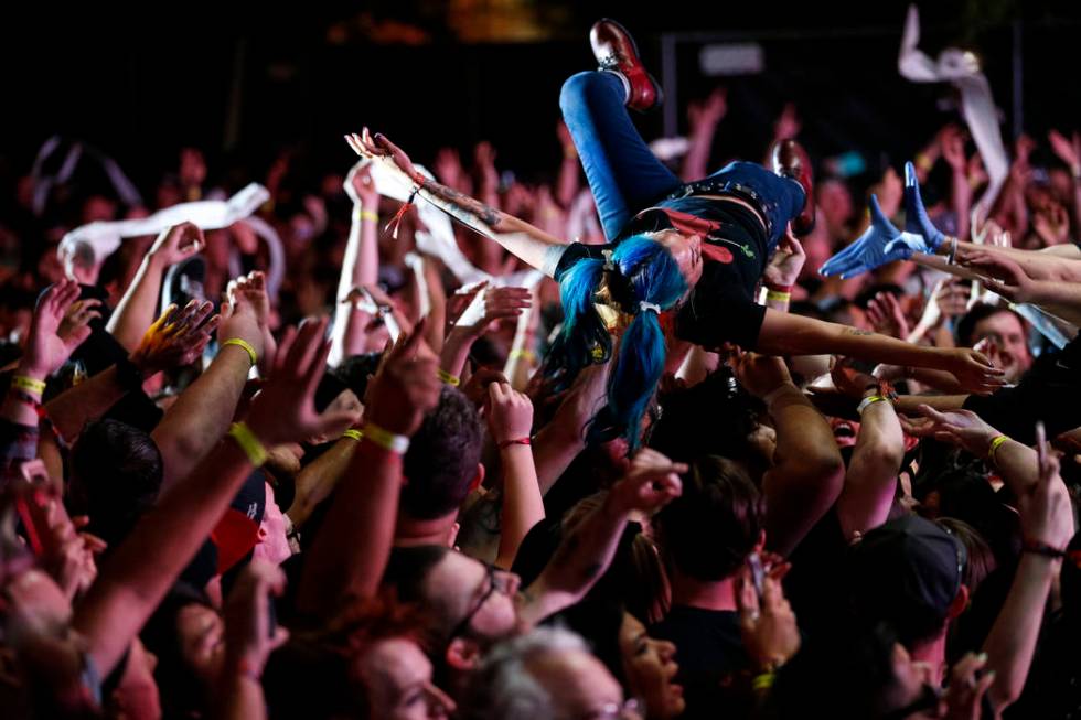 A festival-goer crowd surfs as A Day to Remember performs on day one of the second annual Las Rageous rock festival at the Downtown Las Vegas Events Center on Friday, April 20, 2018. Richard Brian ...