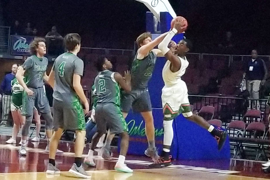 Mojave's Chris Jackson, right, looks to shoot over Churchill County's Thomas Steele in the Class 3A state semifinals at Orleans Arena on Friday, March 1, 2019. Churchill County won 60-59 in overti ...