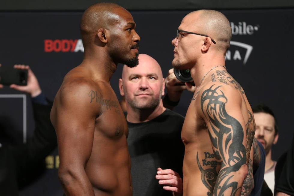 Jon Jones, left, and Anthony Smith, pose during the ceremonial UFC 235 weigh-in event at T-Mobile Arena in Las Vegas, Friday, March 1, 2019. (Erik Verduzco/Las Vegas Review-Journal) @Erik_Verduzco