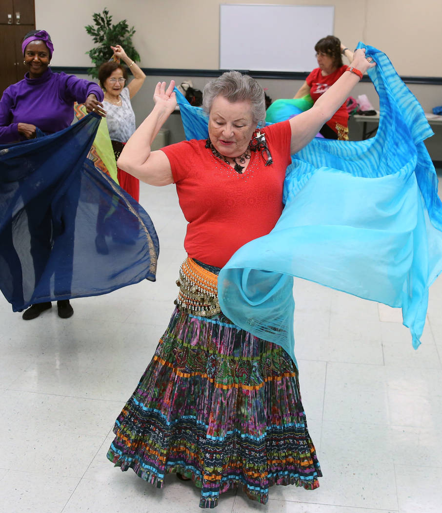 Mary Ann Teixeira, 76, front, Gloria Postal, 58, left, Guadalupe Villa Lyons, 70, second left, and Roberta Culmone, 71, right, belly dance at Las Vegas Senior Center on Friday, March 1, 2019, in L ...