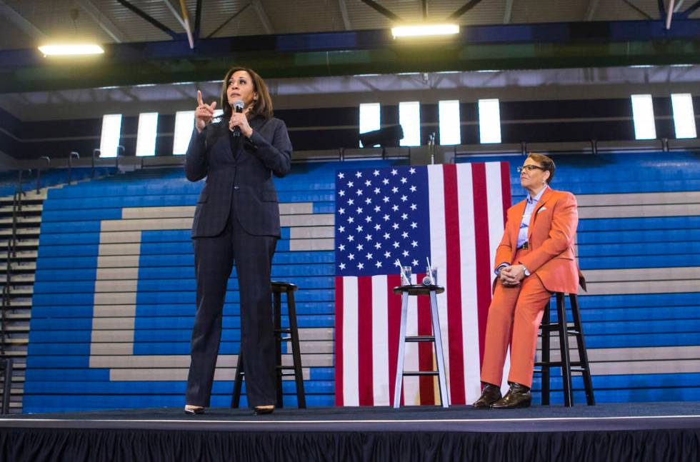 U.S. Sen. Kamala Harris, D-Calif., a Democratic presidential hopeful, speaks alongside state Sen. Pat Spearman, D-North Las Vegas, during a campaign rally at Canyon Springs High School in North La ...