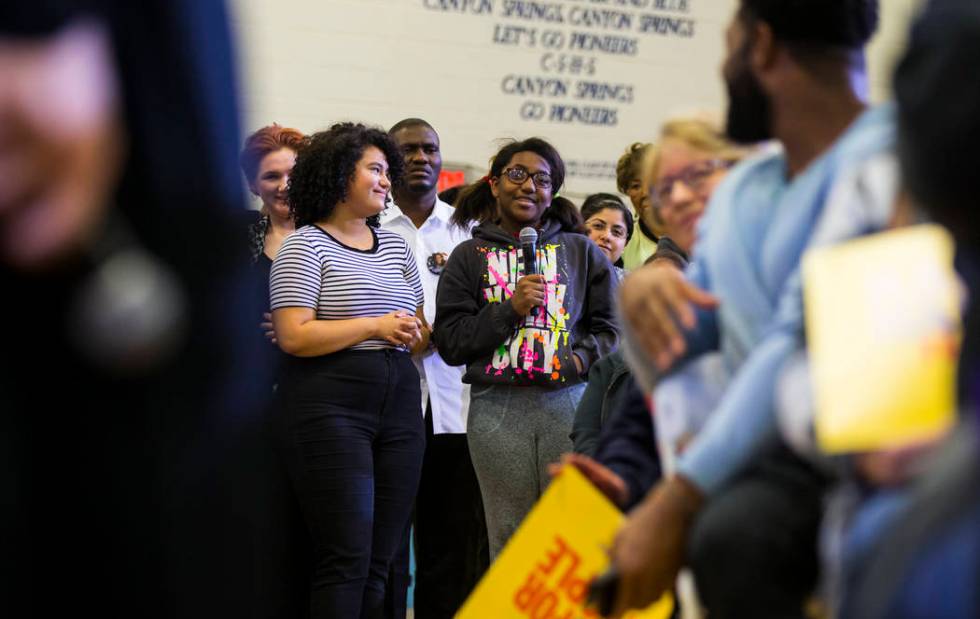 A student asks a question as U.S. Sen. Kamala Harris, D-Calif., a Democratic presidential hopeful, not pictured, answers questions during a campaign rally at Canyon Springs High School in North La ...