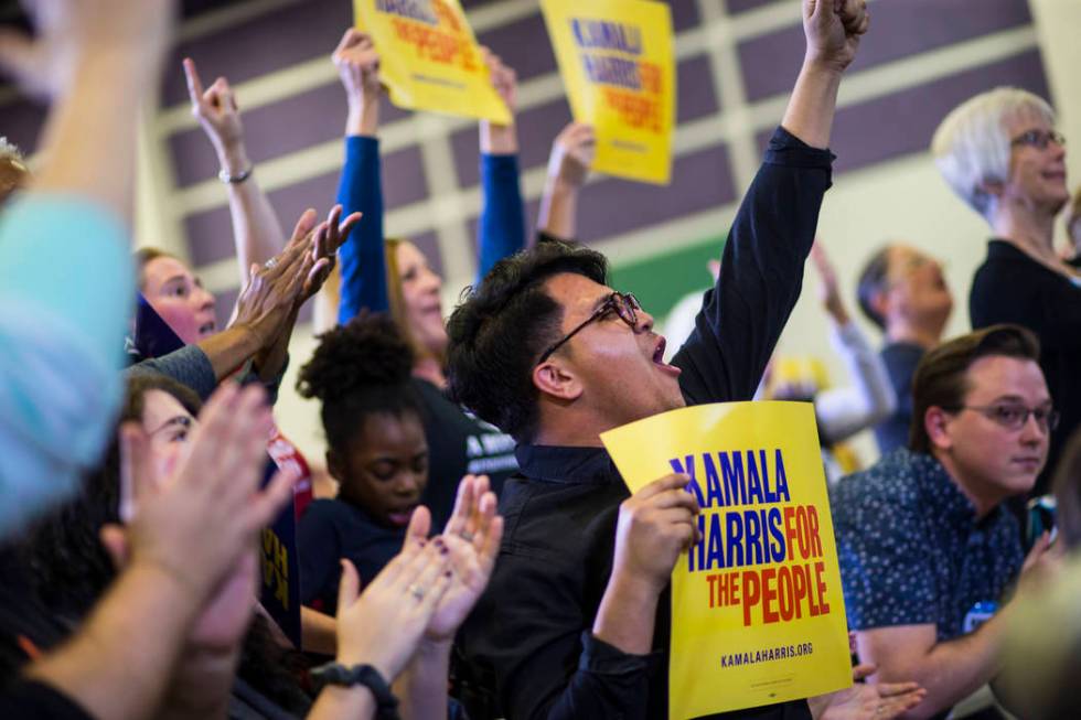 Nick Arellano cheers as U.S. Sen. Kamala Harris, D-Calif., a Democratic presidential hopeful, not pictured, speaks during a campaign rally at Canyon Springs High School in North Las Vegas on Frida ...