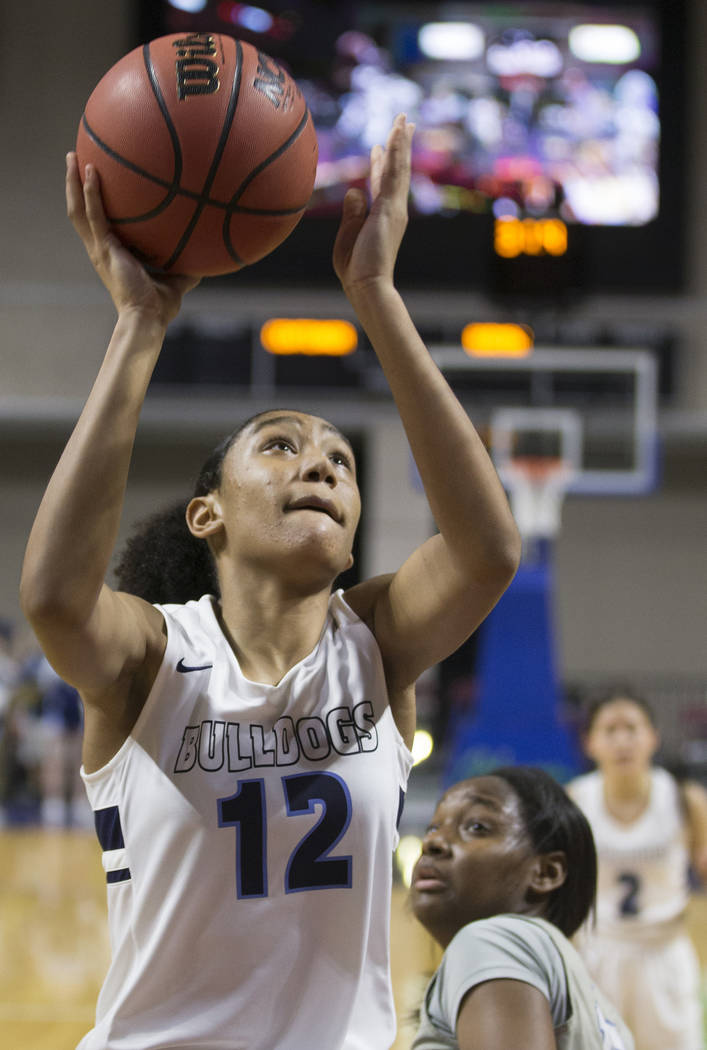 Centennial junior Aishah Brown (12) converts a fast-break layup during the Bulldogs Class 4A girls state championship game with Bishop Gorman on Friday, March 1, 2019, at Orleans Arena, in Las Veg ...