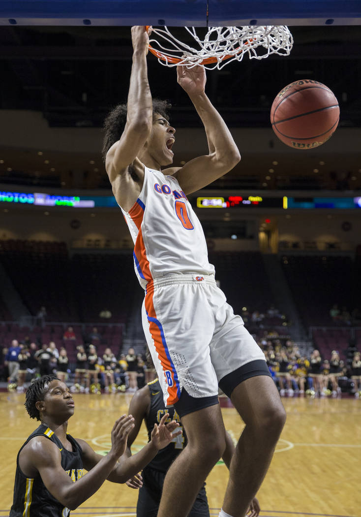 Bishop Gorman junior forward Isaiah Cottrell (0) converts a fast-break dunk in the fourth quarter during the Gaels Class 4A boys state championship game with Clark on Friday, March 1, 2019, at Orl ...