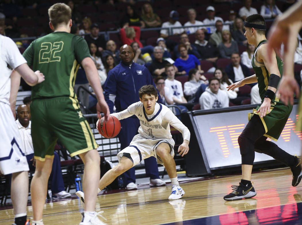 The Meadows guard Noah Klein (1) moves the ball against Incline during the second half of the Class 2A boys basketball state championship game at the Orleans Arena in Las Vegas on Saturday, March ...