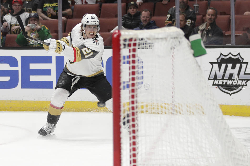 Vegas Golden Knights' Cody Eakin shoots to score an empty-net goal during the third period of the team's NHL hockey game against the Anaheim Ducks on Friday, March 1, 2019, in Anaheim, Calif. The ...