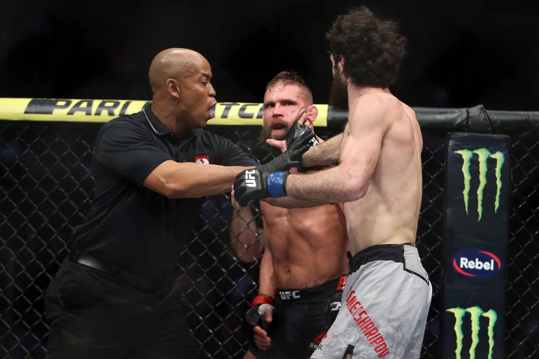 Zabit Magomedsharipov, right, throws a hand after the bell against Jeremy Stephens in the featherweight bout during UFC 235 at T-Mobile Arena in Las Vegas, Saturday, March 2, 2019. Magomedsharipov ...