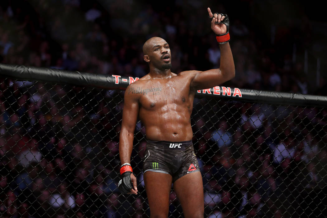 Jon Jones gestures in between rounds against Anthony Smith in the light heavyweight title bout during UFC 235 at T-Mobile Arena in Las Vegas, Saturday, March 2, 2019. Jones won by unanimous decisi ...