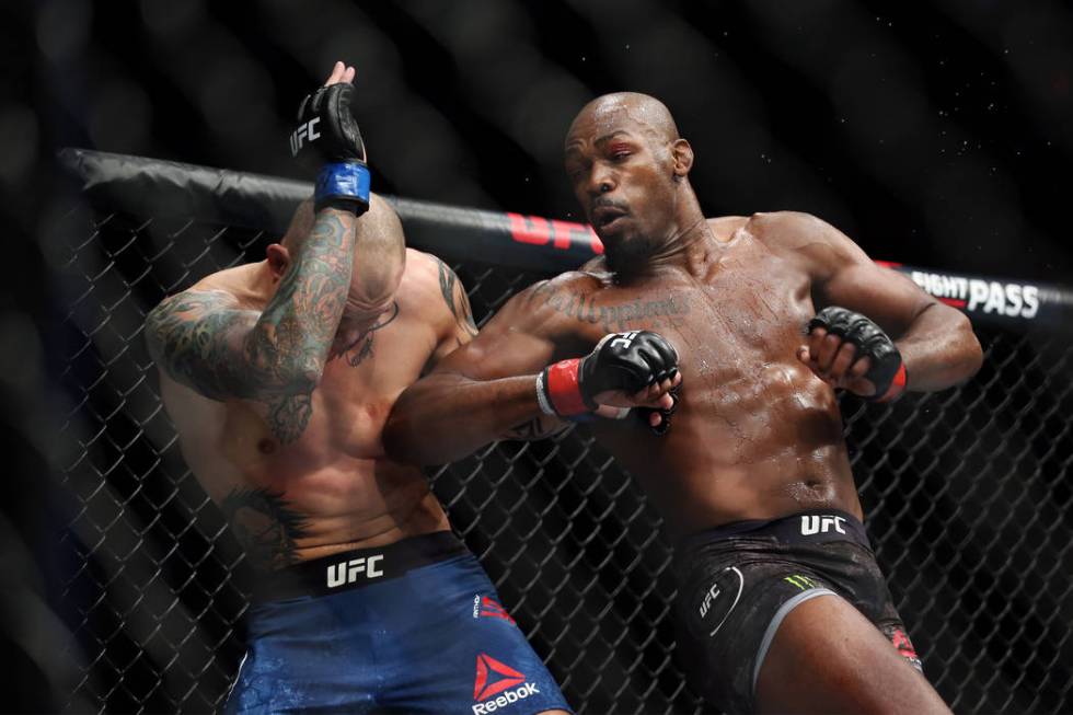 Jon Jones, right, throws an elbow against Anthony Smith in the light heavyweight title bout during UFC 235 at T-Mobile Arena in Las Vegas, Saturday, March 2, 2019. Jones won by unanimous decision. ...