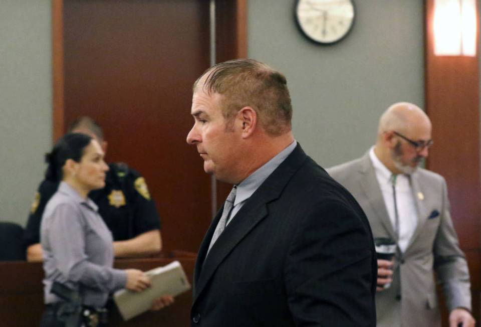 A former Las Vegas fire Capt. Richard Loughry, 48, leaves the courtroom at the Regional Justice Center on Monday, March 4, 2019, in Las Vegas. Loughry pleaded guilty to two felonies after authorit ...