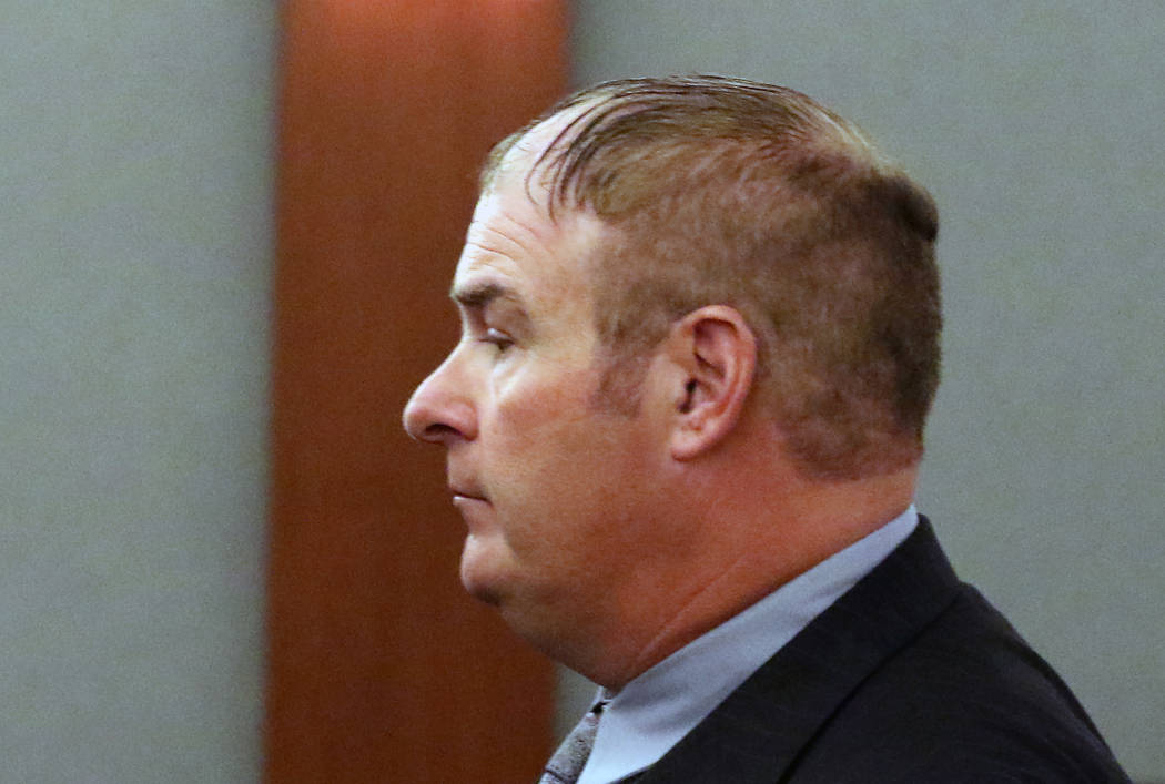 A former Las Vegas Fire Capt. Richard Loughry, 48, leaves the courtroom at the Regional Justice Center on Monday, March 4, 2019, in Las Vegas. Loughry pleaded guilty to two felonies after authori ...