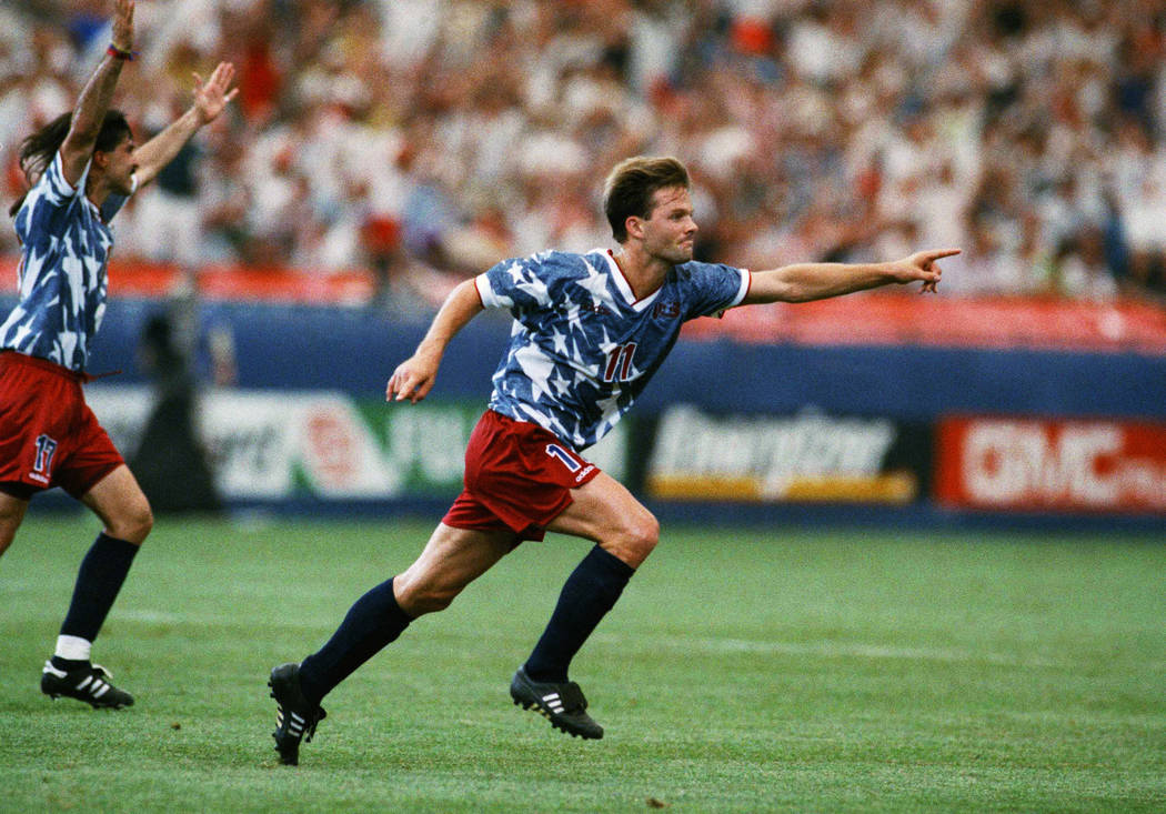 United States national team forward Eric Wynalda, right, reacts after he scored against Switzerland in a World Cup soccer championship Group A first-round match at the Pontiac, Mich., Silverdome o ...