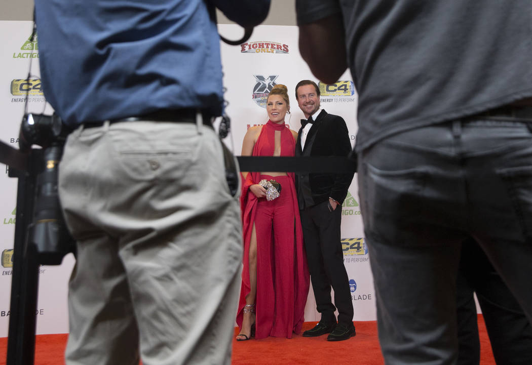 NASCAR driver Kurt Busch, right, with wife Ashley Van Metre during the red carpet event before the start of the 2018 MMA Awards on Tuesday, July 3, 2018, at the Palms hotel-casino, in Las Vegas. B ...