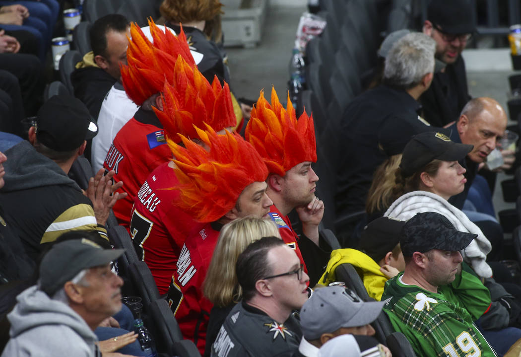 Calgary Flames fans react during the third period of an NHL hockey game against the Golden Knights at T-Mobile Arena in Las Vegas on Wednesday, March 6, 2019. (Chase Stevens/Las Vegas Review-Journ ...