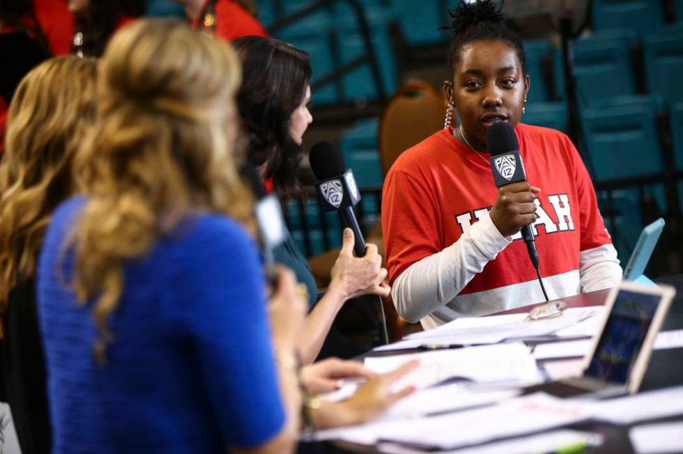 Former Liberty basketball player Dre'Una Edwards, who now plays for Utah, is interviewed on the Pac-12 Network before her team plays Washington in the Pac-12 women's basketball tournament at the M ...