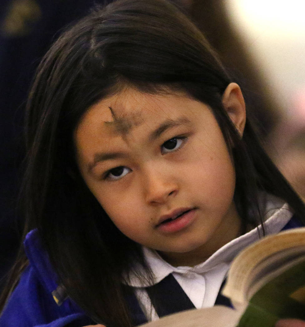 St. Viator Parish School student Delilah DeMarco, 7, celebrates Ash Wednesday at St. Viator Catholic Church on Wednesday, March. 6, 2019, in Las Vegas. Bizuayehu Tesfaye Las Vegas Review-Journal @ ...