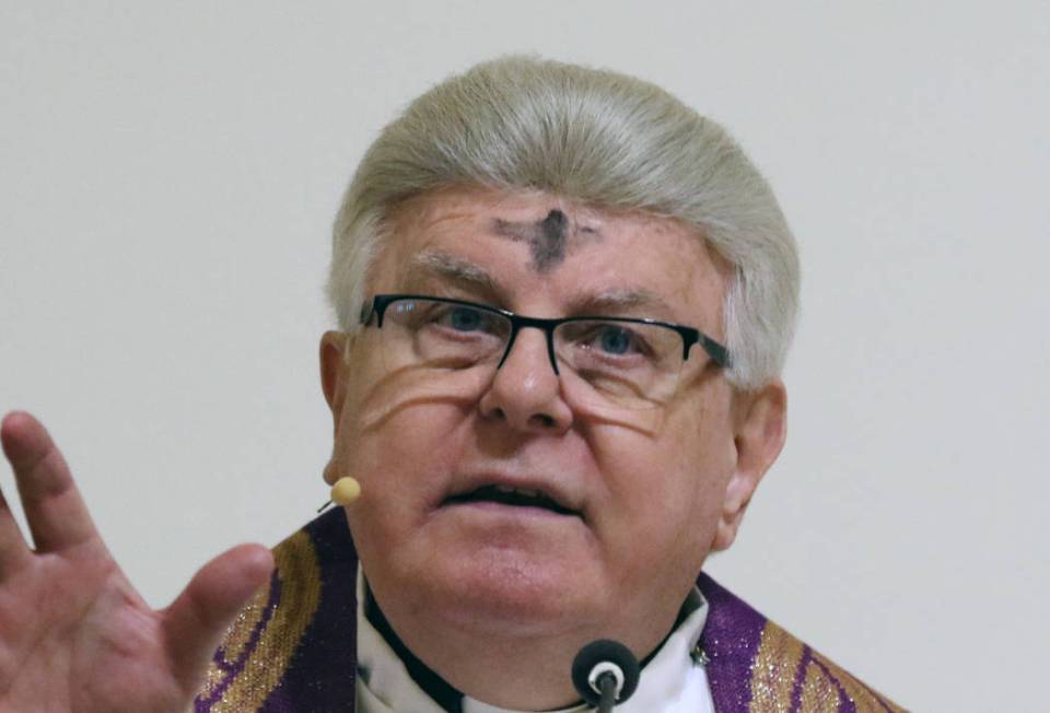 Rev. Larry Lentz celebrates Ash Wednesday at St. Viator Catholic Church on Wednesday, March. 6, 2019, in Las Vegas. Bizuayehu Tesfaye Las Vegas Review-Journal @bizutesfaye