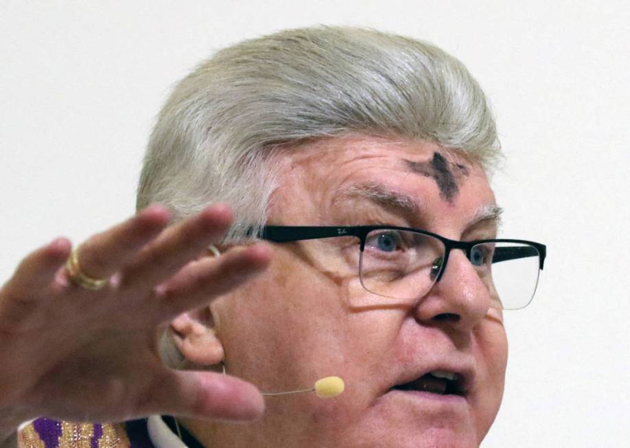 Rev. Larry Lentz celebrates Ash Wednesday at St. Viator Catholic Church on Wednesday, March. 6, 2019, in Las Vegas. Bizuayehu Tesfaye Las Vegas Review-Journal @bizutesfaye