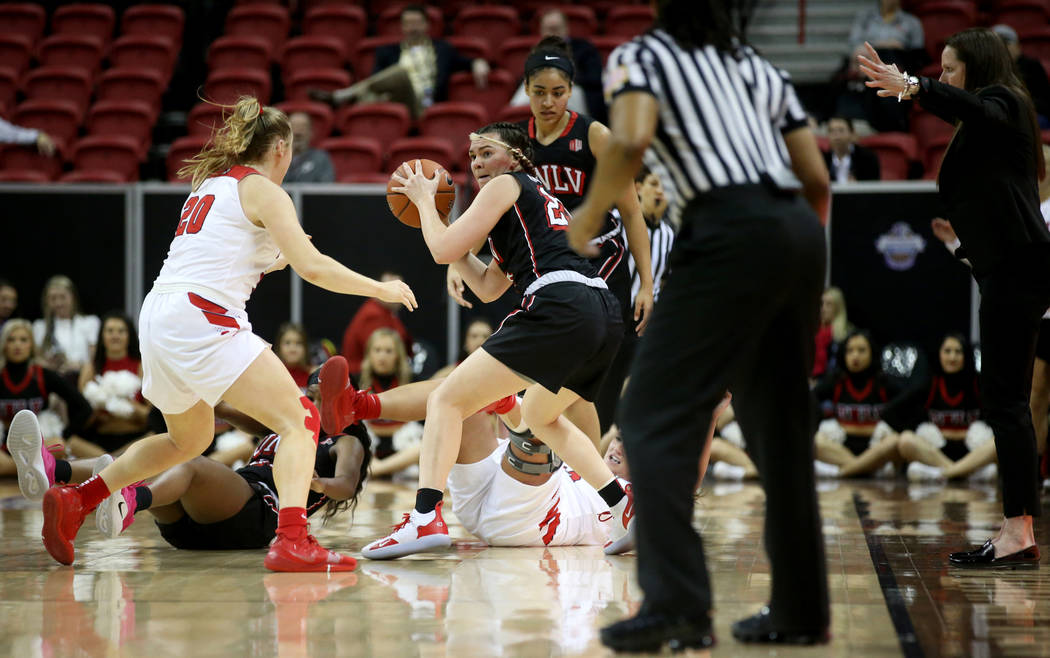 UNLV Lady Rebels forward Alyssa Anderson (20) grabs a loose ball in the first quarter of a quarterfinal game against Fresno State in the Mountain West women's basketball tournament at the Thomas & ...
