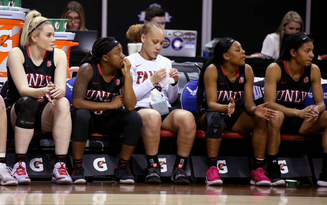 UNLV players react in the final minutes of their quarterfinal against Fresno State during their quarterfinal game in the Mountain West women's basketball tournament at the Thomas & Mack Center ...
