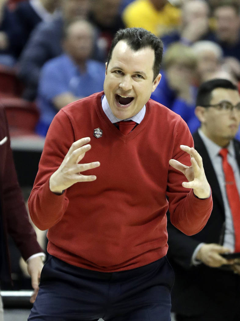 New Mexico head coach Paul Weir instructs his team during the first half of an NCAA college basketball game against Wyoming in the Mountain West Conference tournament, Wednesday, March 13, 2019, i ...