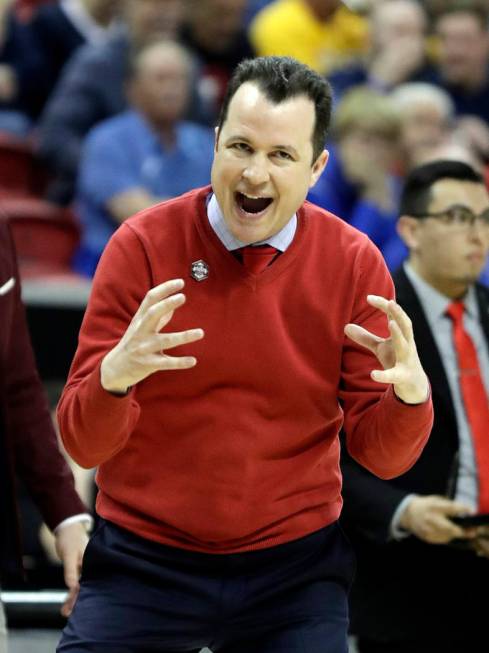 New Mexico head coach Paul Weir instructs his team during the first half of an NCAA college basketball game against Wyoming in the Mountain West Conference tournament, Wednesday, March 13, 2019, i ...