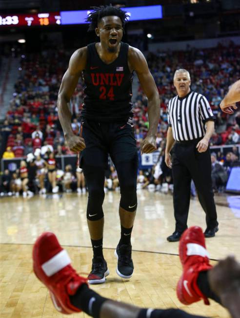 UNLV Rebels forward Joel Ntambwe (24) celebrates after a foul was called against San Diego State during the first half of a quarterfinal game in the Mountain West men's basketball tournament at th ...