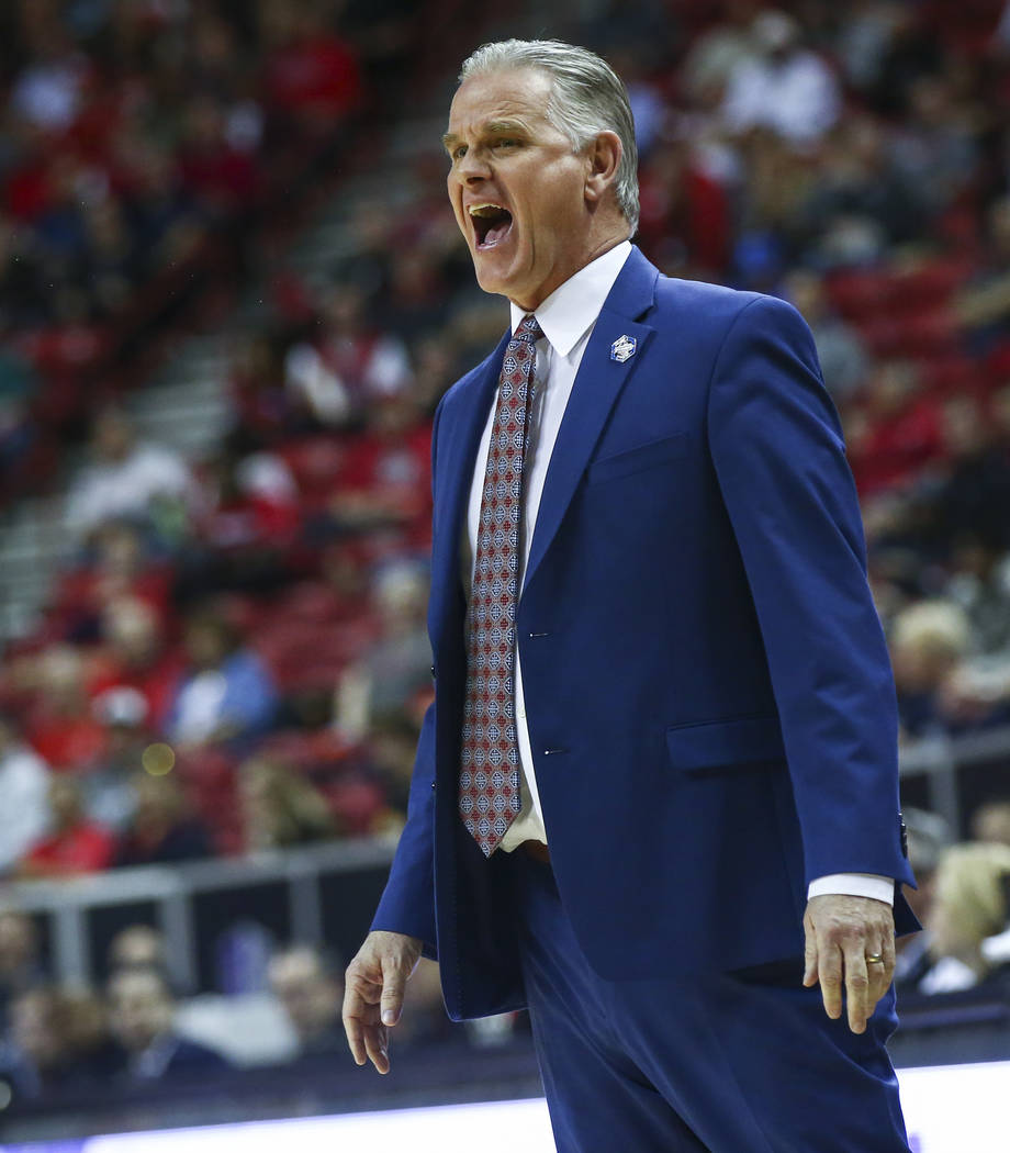 San Diego State Aztecs head coach Brian Dutcher reacts during the first half of a quarterfinal game against UNLV in the Mountain West men's basketball tournament at the Thomas & Mack Center in ...