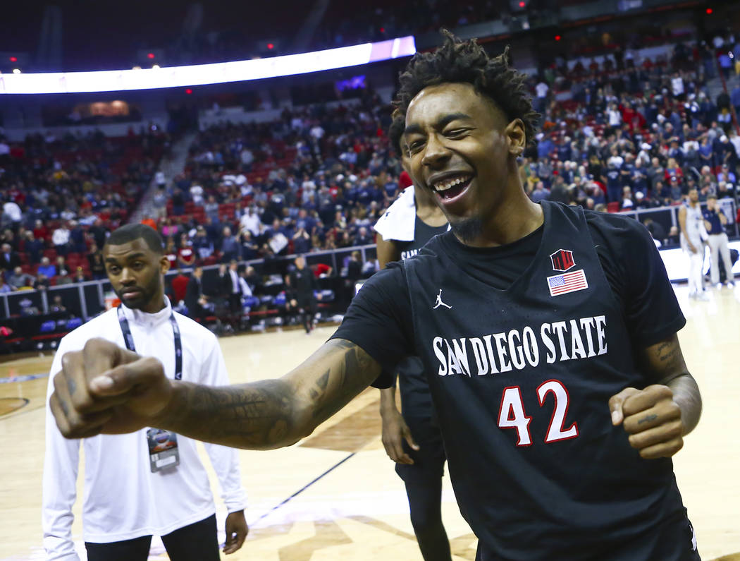 San Diego State Aztecs guard Jeremy Hemsley (42) celebrates his team's win against UNR in a semifinal basketball game at the Mountain West men's basketball tournament at the Thomas & Mack Cent ...