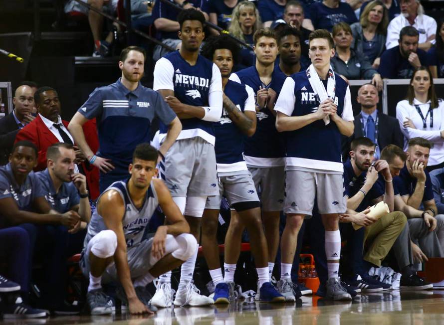 UNR players react as their team trails against San Diego State during the second half of a semifinal basketball game in the Mountain West men's basketball tournament at the Thomas & Mack Cente ...