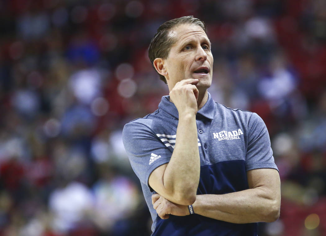 UNR Wolf Pack head coach Eric Musselman looks on during the first half of a semifinal basketball game against San Diego State in the Mountain West men's basketball tournament at the Thomas & M ...