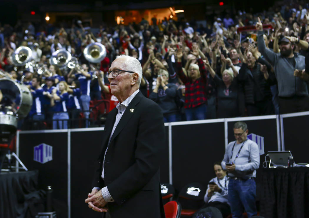 Former San Diego State head coach Steve Fisher looks on after SDSU defeated UNR in a semifinal basketball game at the Mountain West men's basketball tournament at the Thomas & Mack Center in L ...